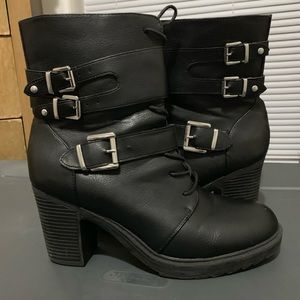 Black, lace-up booties with buckled straps